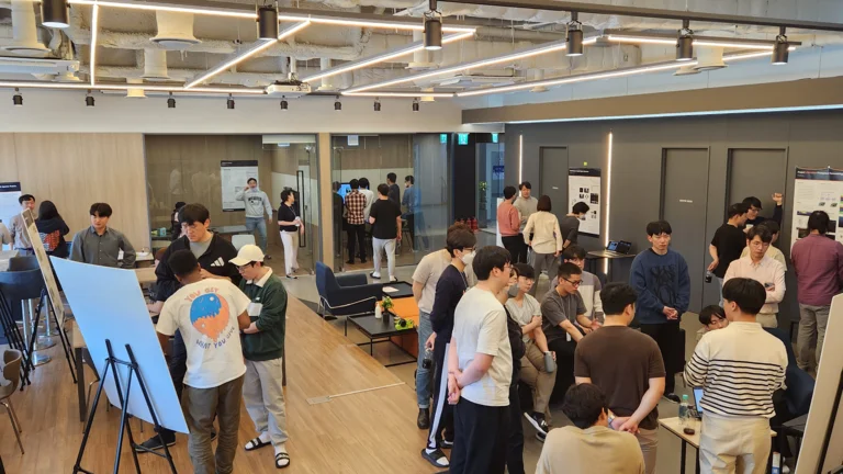 The employees at ThorDrive are presenting each other's achievements.