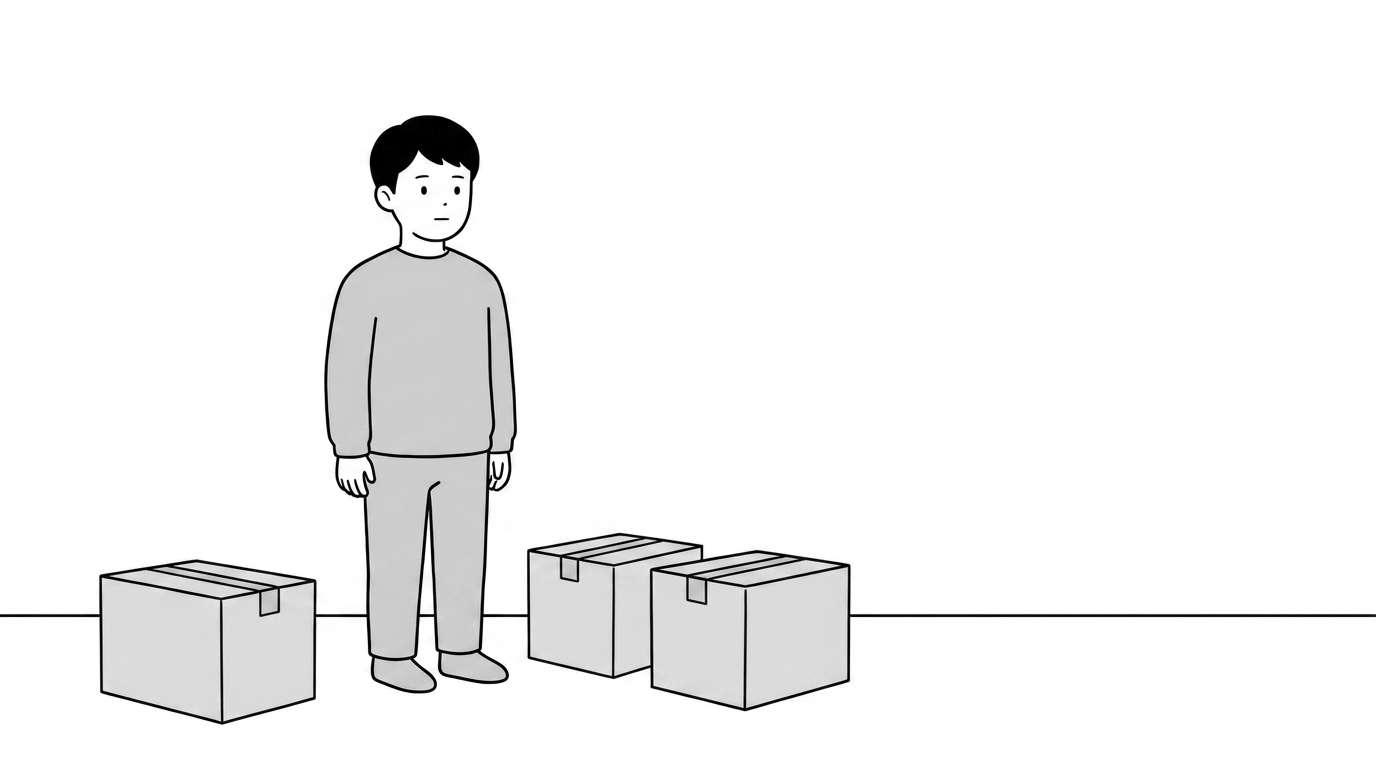 The asker stands alone in an empty room with two cardboard m