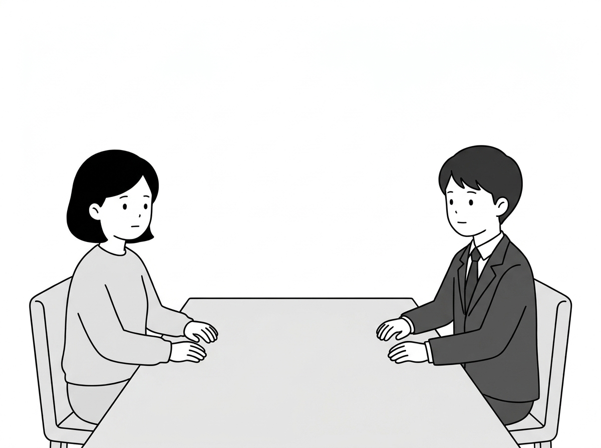 The asker and the agent sit facing each other at the same pl